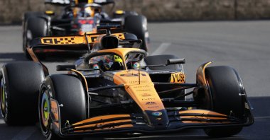 Australian driver Oscar Piastri of McLaren F1 Team leads and Mexican driver Sergio Perez of Red Bull Racing in action during the 2024 Formula One Grand Prix of Azerbaijan, at the Baku City Circuit, Baku, Azerbaijan, Sept. 15, 2024. (EPA Photo)