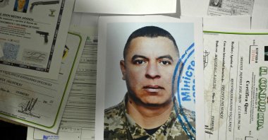 A picture of retired Colombian military officer Jose Medina is seen next to other documents at his house, Popayan, Cauca department, Colombia, Sept. 13, 2024. (AFP Photo)