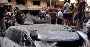 People check the damage following an Israeli strike in Beirut&#039;s southern suburbs, Sept. 20, 2024. (AFP Photo)