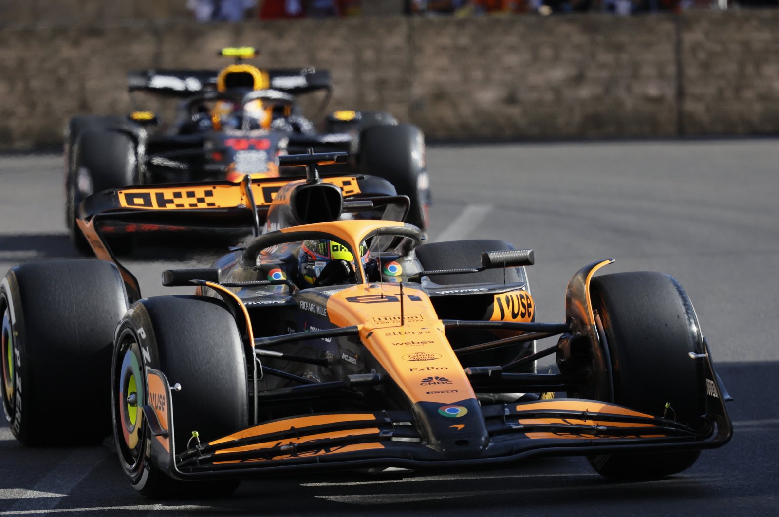 Australian driver Oscar Piastri of McLaren F1 Team leads and Mexican driver Sergio Perez of Red Bull Racing in action during the 2024 Formula One Grand Prix of Azerbaijan, at the Baku City Circuit, Baku, Azerbaijan, Sept. 15, 2024. (EPA Photo)