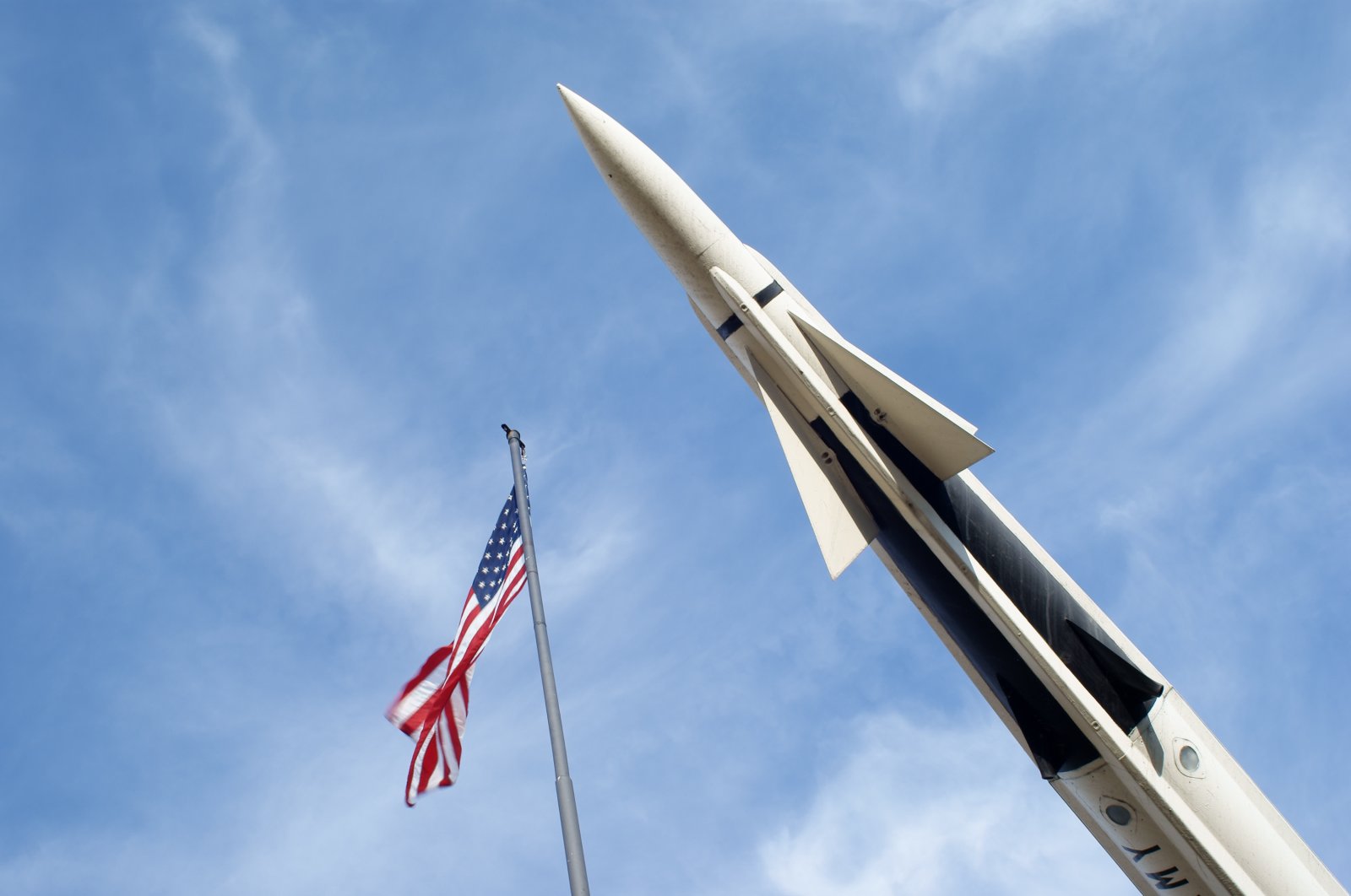 Photo of a missile next to an American flag. (Getty Images Photo)