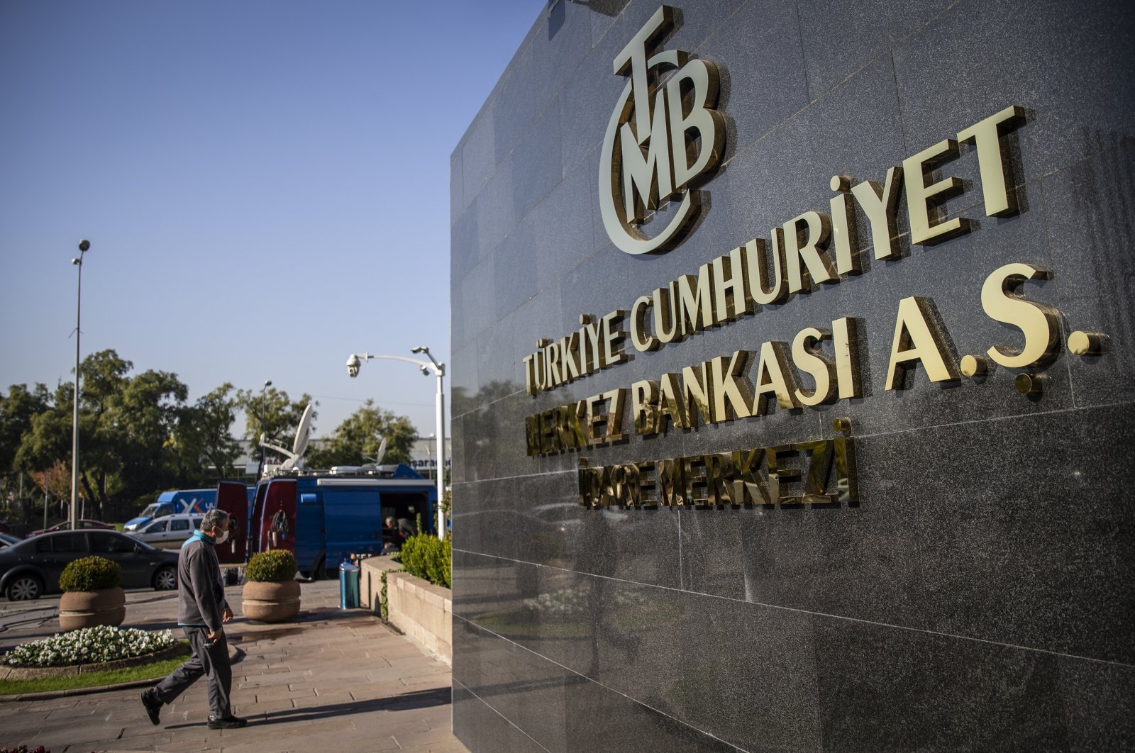 A man passes by the headquarters of the Central Bank of the Republic of Türkiye (CBRT), Ankara, Türkiye, Oct. 28, 2021. (AA Photo)