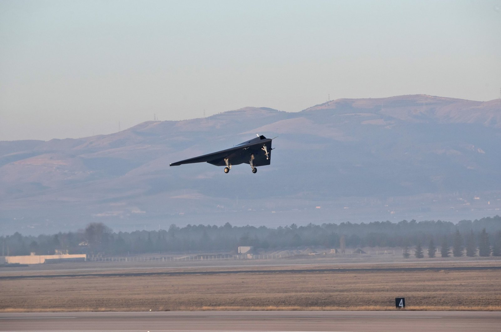 Türkiye&#039;s new jet-powered stealth combat drone Anka-3 takes off to perform its maiden flight, in Ankara, Türkiye, Dec. 28, 2023. (AA File Photo)