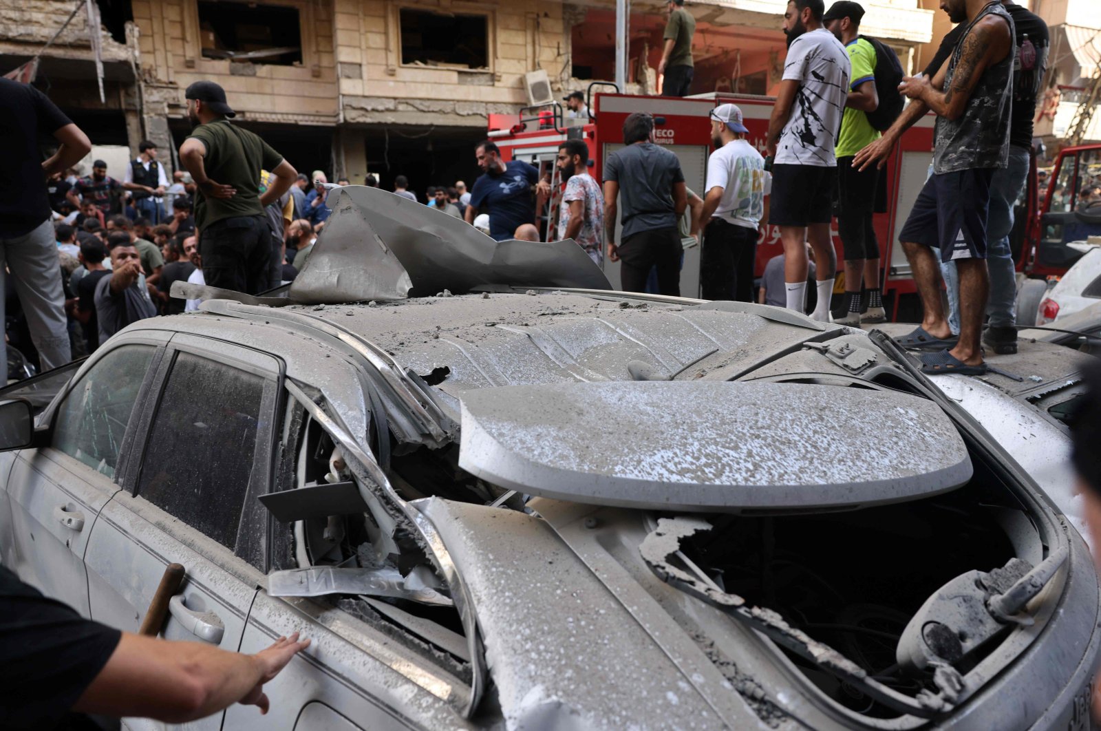 People check the damage following an Israeli strike in Beirut&#039;s southern suburbs, Sept. 20, 2024. (AFP Photo)