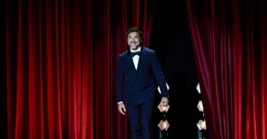 Spanish actor Javier Bardem smiles as he takes the stage to receive the Donostia Lifetime Achievement Award in recognition of his distinguished film career during the opening gala of the 72nd San Sebastian International Film Festival, San Sebastian, Spain, Sept. 20, 2024. (AFP Photo)