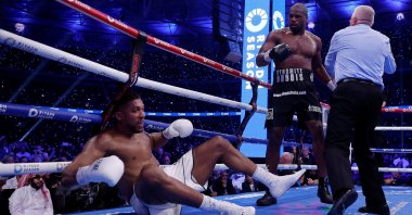 Anthony Joshua after being knocked down by Daniel Dubois in the IBF World Heavyweight Title fight, London, U.K., Sept. 21, 2024. (Reuters Photo)