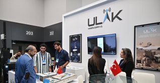 A booth of ULAK Haberleşme A.Ş. is seen on the sidelines of the 6G Conference in Istanbul, Türkiye, Sept. 23, 2024. (AA Photo)