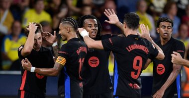 Barcelona players celebrate Pablo Torre's (L) goal during the La Liga match against Villarreal at Estadio de la Ceramica, Villarreal, Spain, Sept. 22, 2024. (Reuters Photo) 