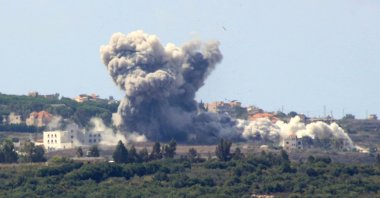 Smoke billows from the site of an Israeli airstrike in the Lebanese village of Tayr Harfa, near the Lebanon-Israel border, Sept. 23, 2024. (AFP Photo)