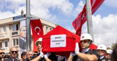 Honor guards carry the coffin of Turkish American activist Ayşenur Ezgi Eygi before her burial in Didim, Aydın, western Türkiye, Sept. 14, 2024. (AA Photo)