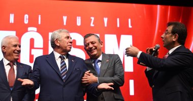 Ankara Mayor Mansur Yavaş (L) gestures as he and Republican People's Party's (CHP) Chair Özgür Özel (C) listen to Istanbul Mayor Ekrem Imamoğlu (R), at the CHP's charter convention, Ankara, Türkiye, Sept. 7, 2024. (AA Photo)