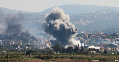Smoke billows over southern Lebanon following Israeli strikes as seen from Tyre, southern Lebanon, Sept. 23, 2024. (Reuters Photo)
