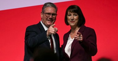 Britain&amp;#039;s Treasury chief Rachel Reeves reacts with Prime Minister Keir Starmer after speaking on the second day of the annual Labour Party conference in Liverpool, northwest England, Sept. 23, 2024. (AFP Photo)