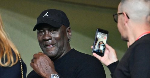 U.S. former basketball player Michael Jordan (C) attends the UEFA Champions League first round Day 1 football match between Monaco and Barcelona at the Louis II Stadium, Monaco, Sept. 19, 2024. (AFP Photo)