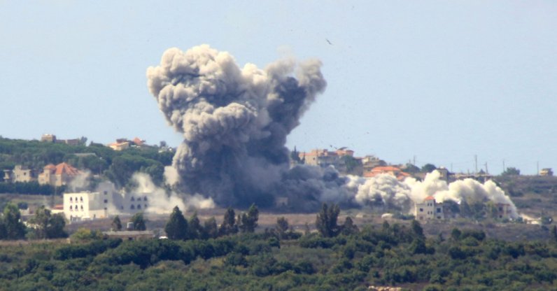 Smoke billows from the site of an Israeli airstrike in the Lebanese village of Tayr Harfa, near the Lebanon-Israel border, Sept. 23, 2024. (AFP Photo)