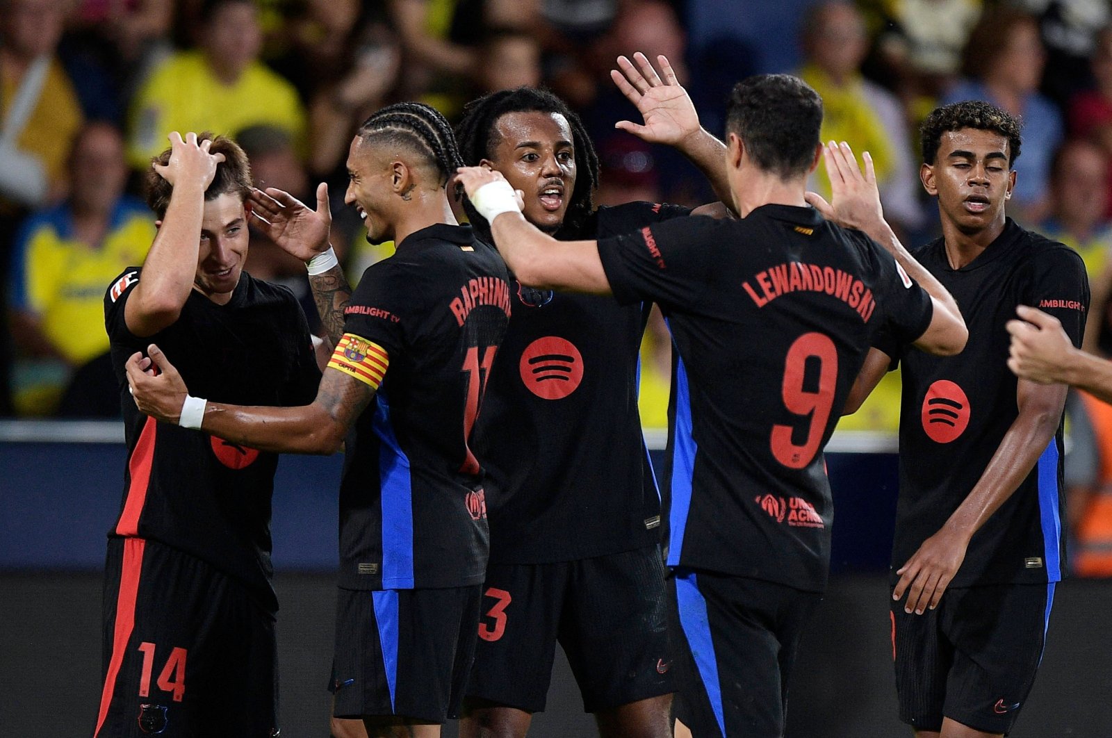 Barcelona players celebrate Pablo Torre&#039;s (L) goal during the La Liga match against Villarreal at Estadio de la Ceramica, Villarreal, Spain, Sept. 22, 2024. (Reuters Photo) 