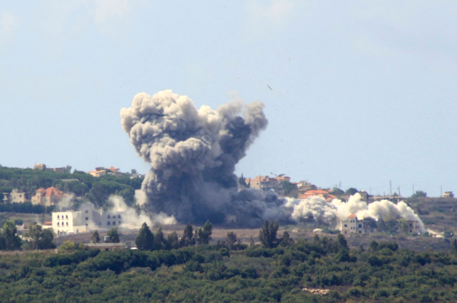 Smoke billows from the site of an Israeli airstrike in the Lebanese village of Tayr Harfa, near the Lebanon-Israel border, Sept. 23, 2024. (AFP Photo)