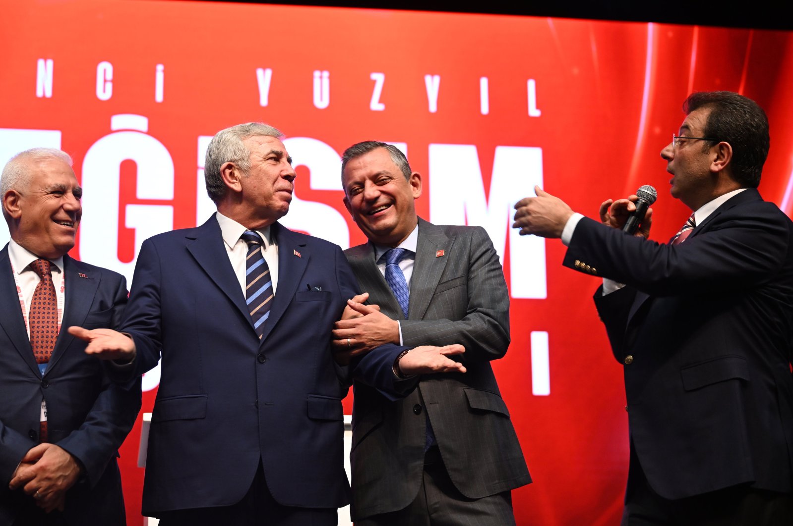 Ankara Mayor Mansur Yavaş (L) gestures as he and Republican People&#039;s Party&#039;s (CHP) Chair Özgür Özel (C) listen to Istanbul Mayor Ekrem Imamoğlu (R), at the CHP&#039;s charter convention, Ankara, Türkiye, Sept. 7, 2024. (AA Photo)