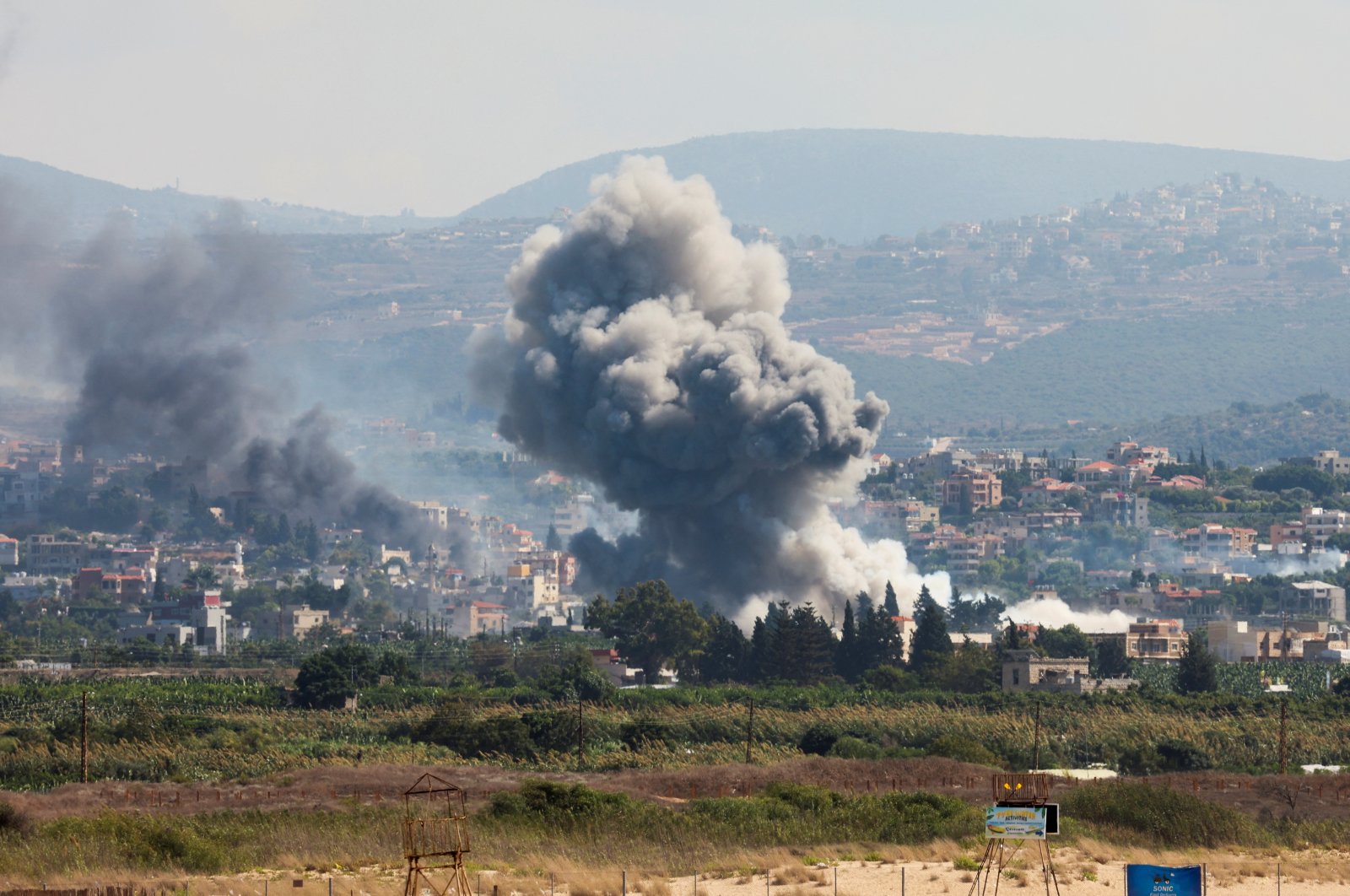 Smoke billows over southern Lebanon following Israeli strikes as seen from Tyre, southern Lebanon, Sept. 23, 2024. (Reuters Photo)