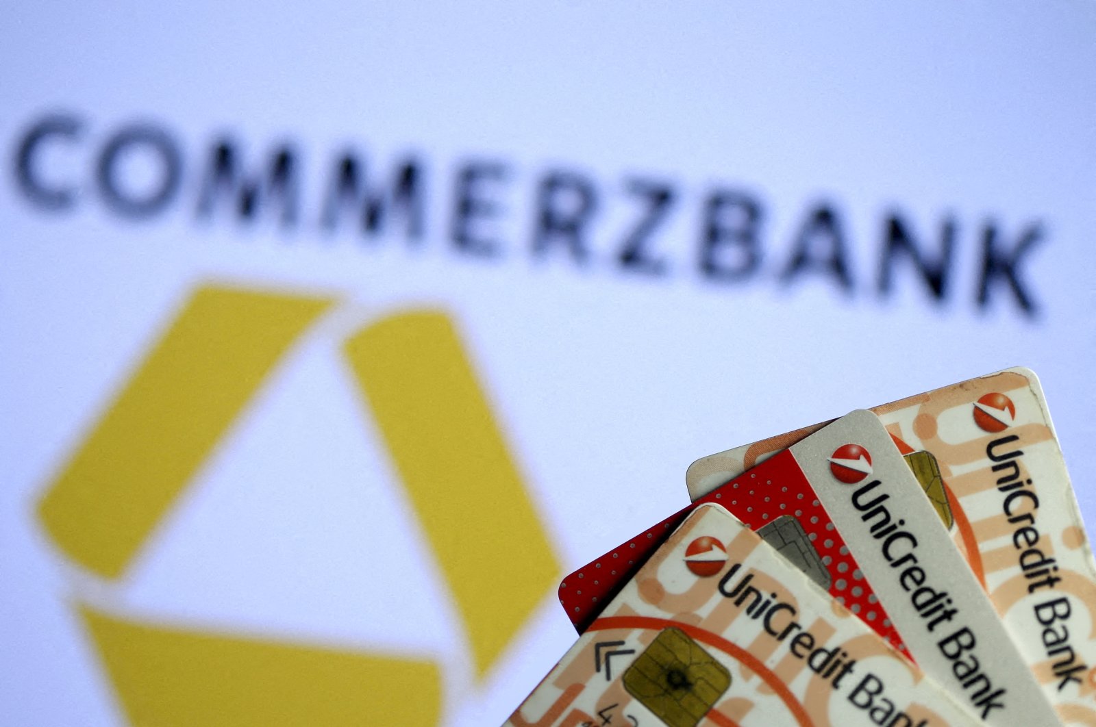 UniCredit credit cards are seen in front of a displayed Commerzbank logo in this illustration taken on Sept. 20, 2017. (Reuters Photo)