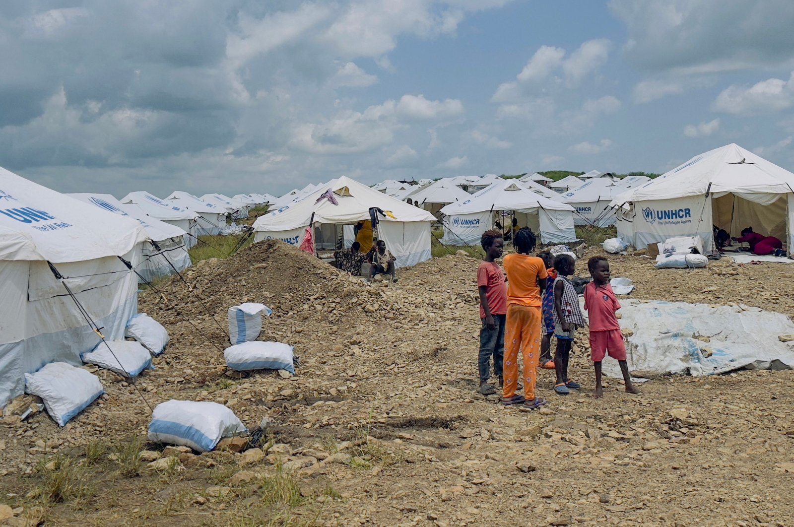 Displaced Sudanese children gather amid tents in a refugee camp in Gallabat, Sudan, Sept. 4, 2024. (AFP Photo)