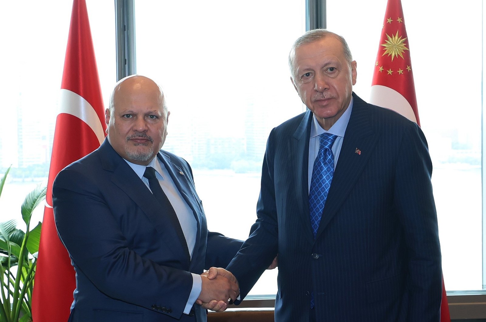 President Recep Tayyip Erdoğan and ICC chief Karim Khan shake hands at the Turkish House in New York, Sept. 23, 2024. (IHA Photo)