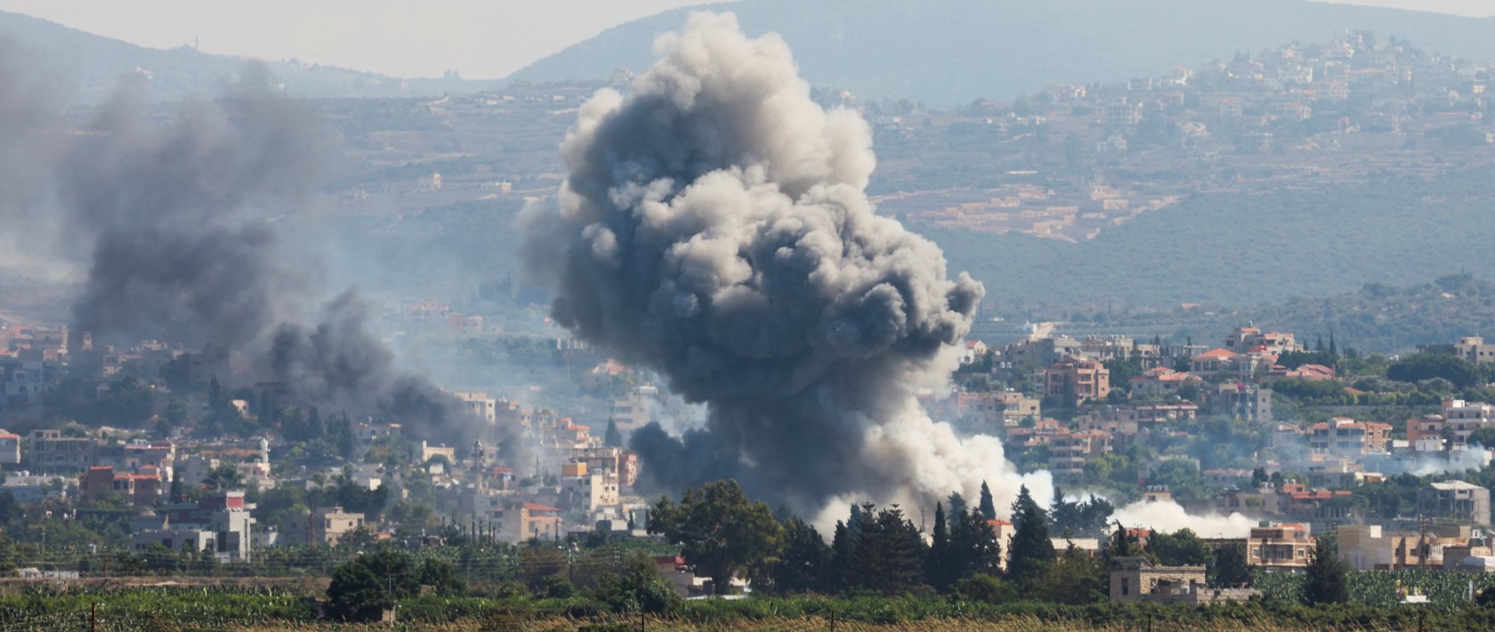Smoke billows over southern Lebanon following Israeli strikes as seen from Tyre, southern Lebanon, Sept. 23, 2024. (Reuters Photo)