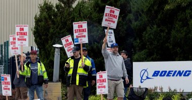Boeing factory workers gather on a picket line during the first day of a strike near the entrance of a production facility in Renton, Washington, U.S., Sept. 13, 2024. (Reuters Photo)