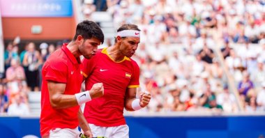 Team Spain's Carlos Alcaraz (L) with partner Rafael Nadal in action during the match against Team Netherlands' Tallon Griekspoor and Wesley Koolhof at the Olympic Games Paris 2024 at Roland Garros, Paris, France, July 30, 2024. (Getty Images Photo)