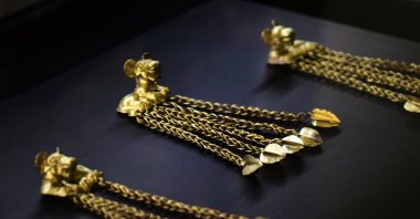 Gold artifacts are displayed in the exhibition "Ulu Dala Altındarı" ("The Gold of the Great Steppe"), Astana, Kazakhstan, Sept. 21, 2024. (AA Photo)