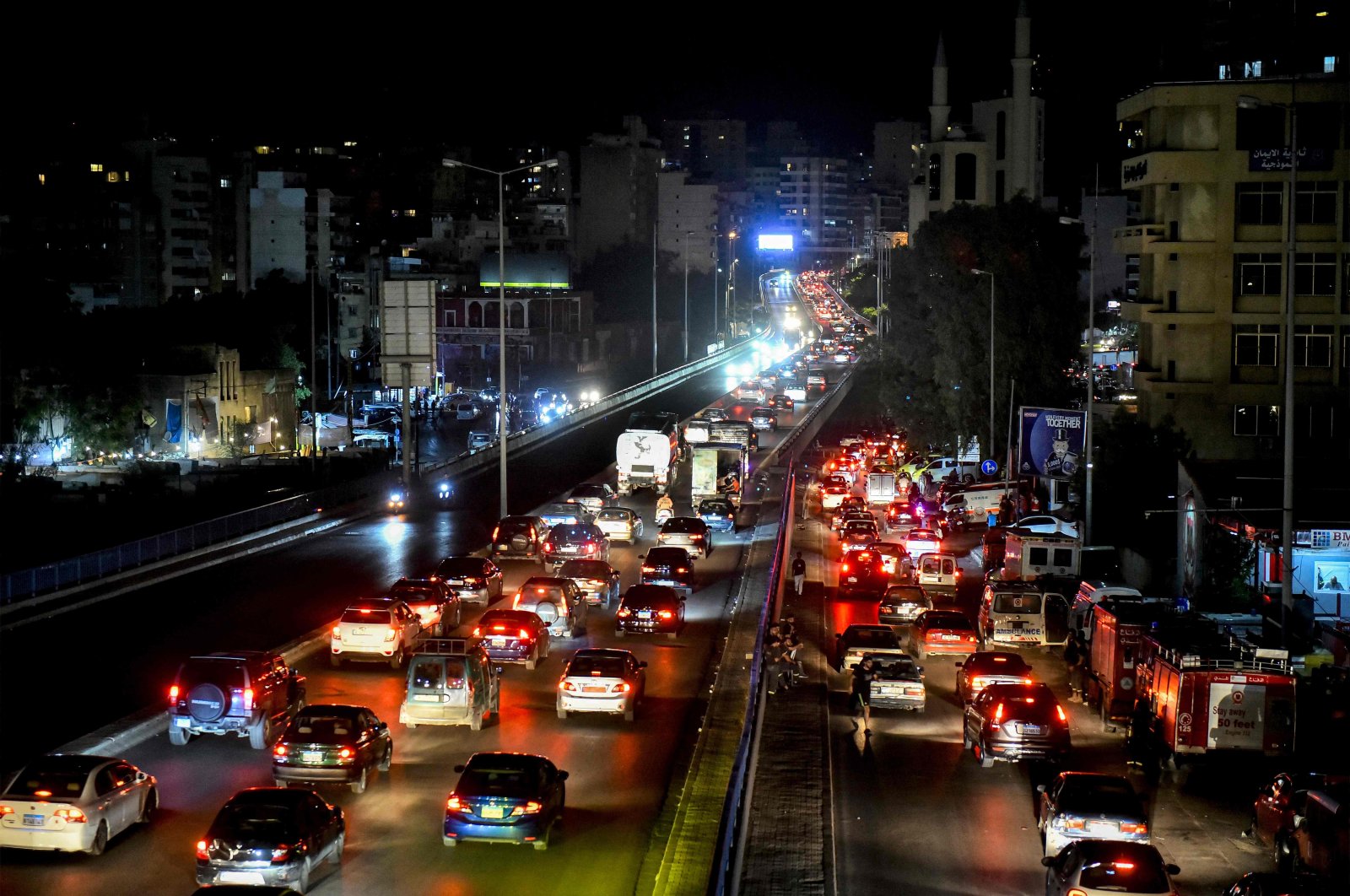 Vehicles move along a congested highway along the southern entry to Beirut, Lebanon, Sept. 23, 2024. (AFP Photo)