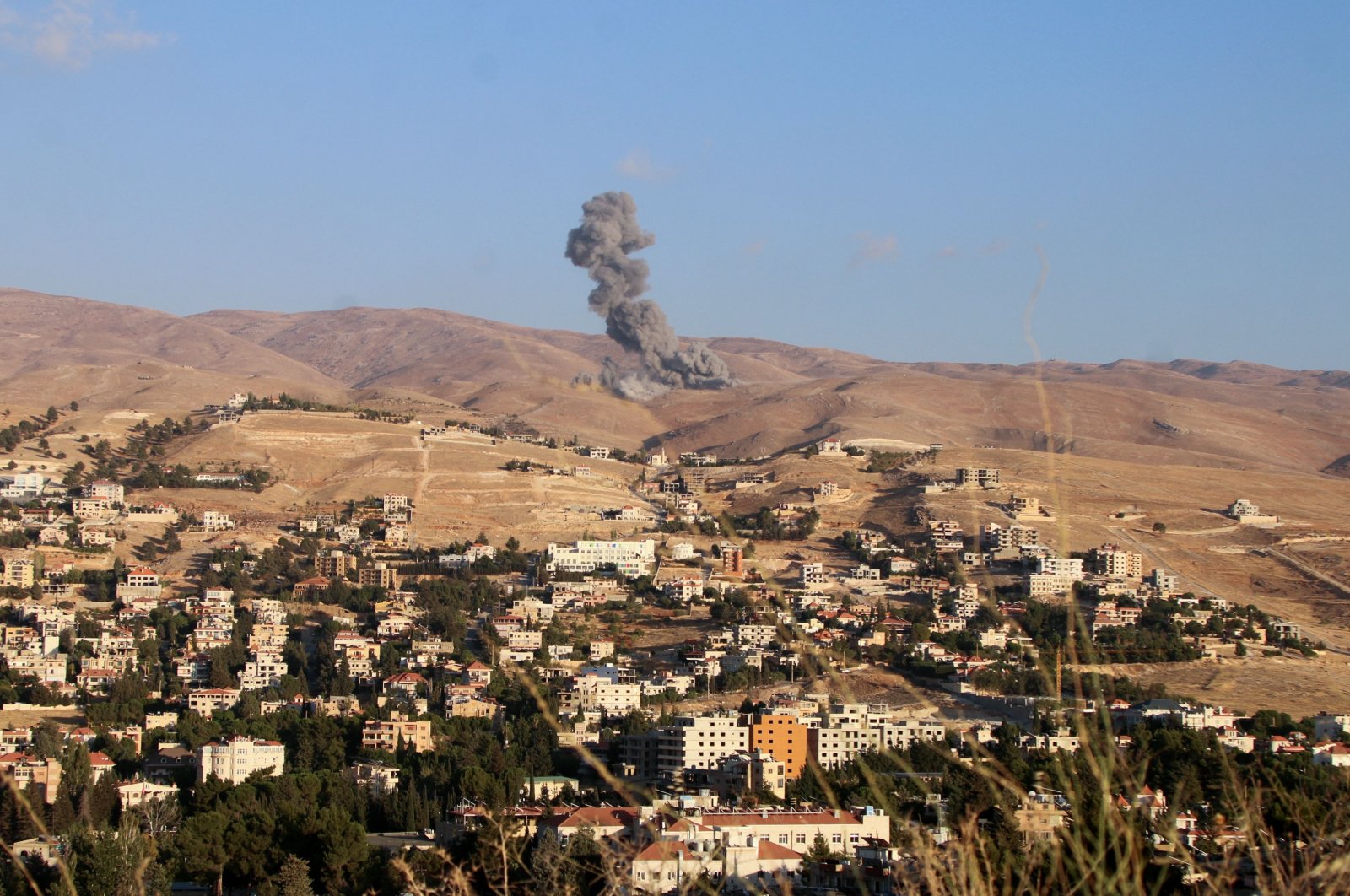 Smoke billows from the site of an Israeli airstrike on the eastern areas of Baalbeck in the Bekaa Valley killing 274 people, including 21 children, southern Lebanon, Sept. 23, 2024. (AFP Photo)