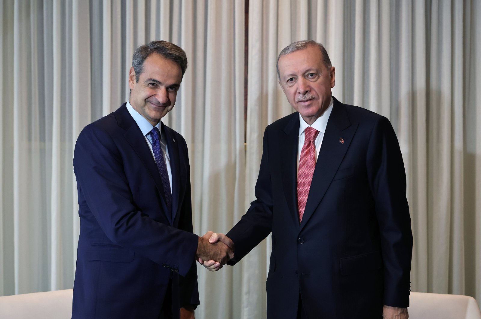 President Recep Tayyip Erdoğan and Greek Prime Minister Kyriakos Mitsotakis shake hands as they meet at the U.N. headquarters in New York, Sept. 24, 2024. (AA Photo)