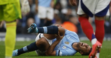Manchester City&#039;s Rodri reacts after sustaining an injury during the Premier League match against Arsenal at the Etihad Stadium, Manchester, U.K., Sept. 22, 2024. (Reuters Photo)