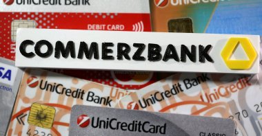 A 3-D printed Commerzbank logo is seen near Unicredit credit cards in this illustration taken on Sept. 20, 2017. (Reuters Photo)
