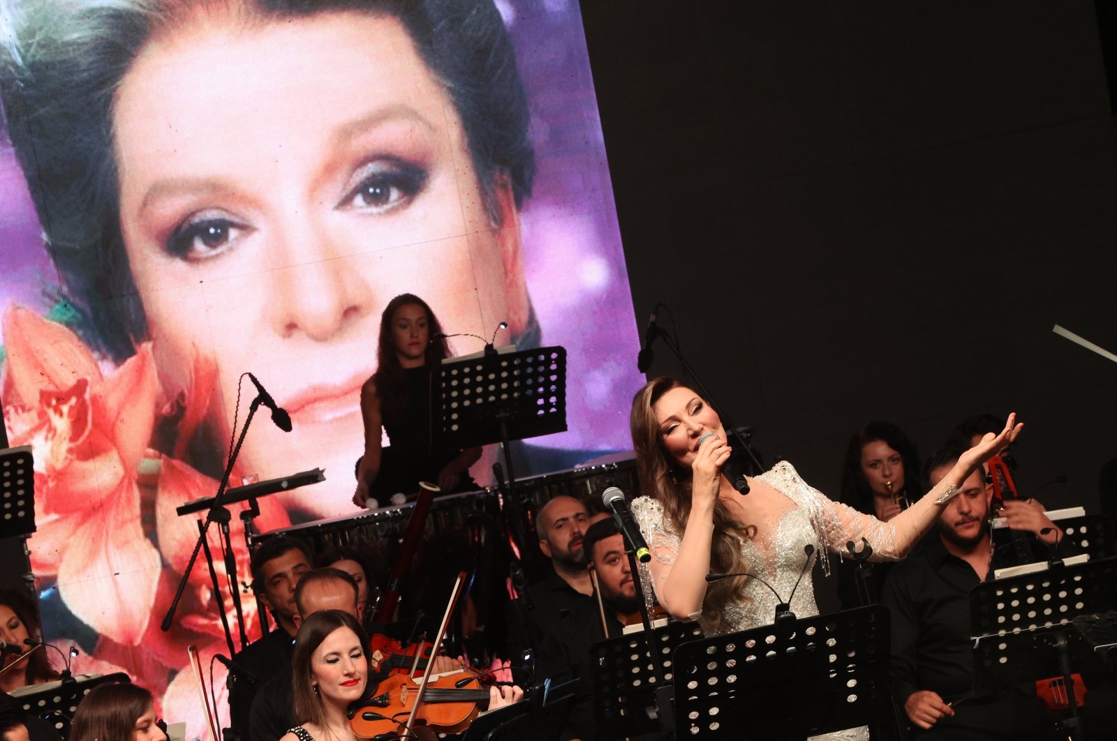 Turkish singer Umut Akyürek performs during a concert to honor Zeki Müren in Bodrum, western Türkiye, Sept. 24, 2024. (AA Photo)