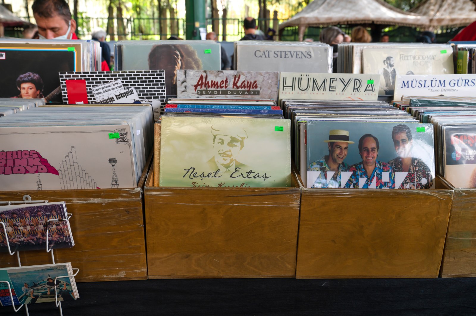 An old record by Turkish folk music legend Neşet Ertaş (C) is for sale at a shop in an open market, Ankara, Türkiye, Oct. 3, 2021. (Shutterstock Photo)