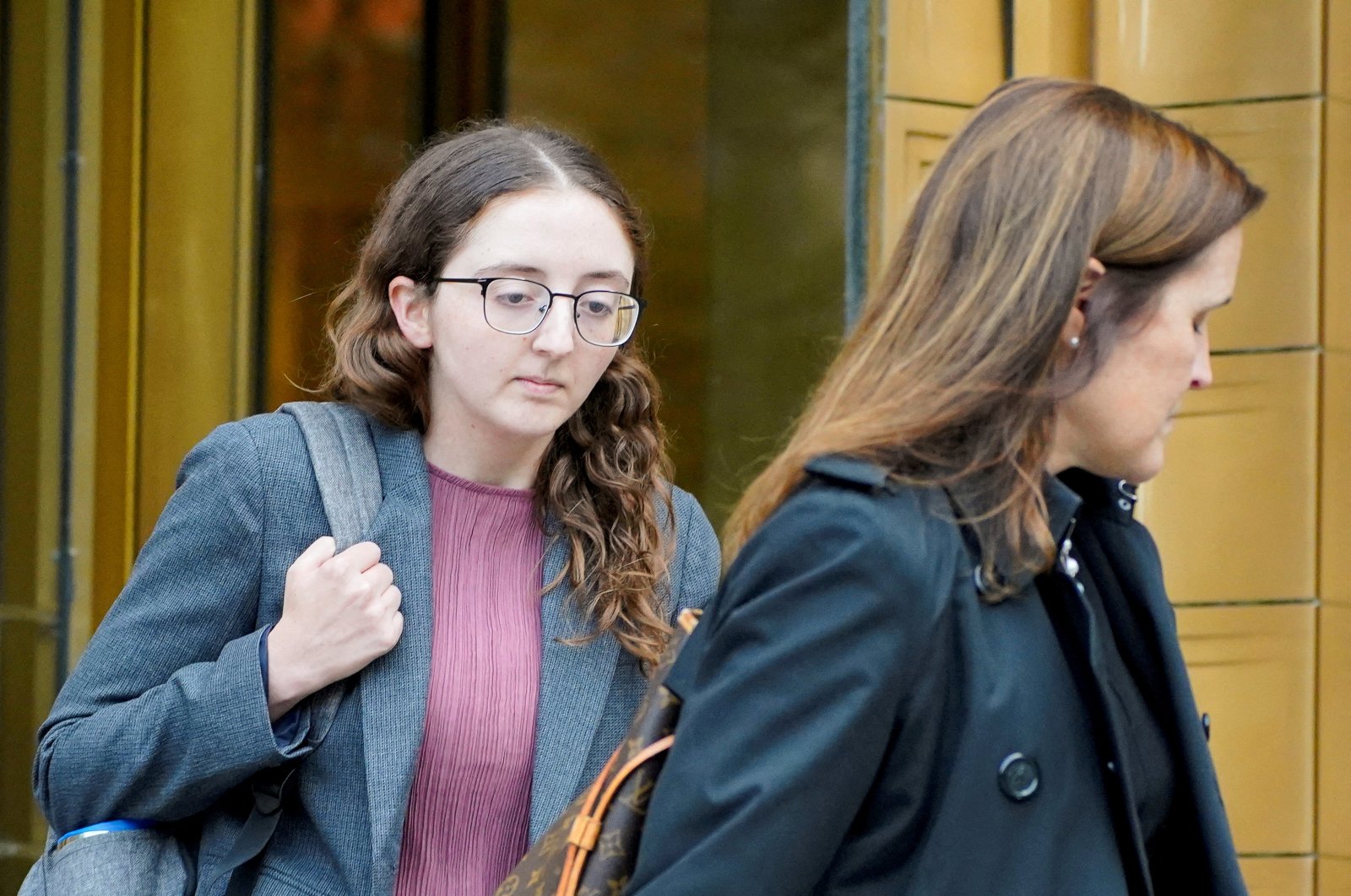 Former crypto hedge fund Alameda Research CEO Caroline Ellison departs the trial of former FTX Chief Executive Sam Bankman-Fried, who is facing fraud charges over the collapse of the bankrupt cryptocurrency exchange, New York City, U.S., Oct. 10, 2023. (Reuters Photo)