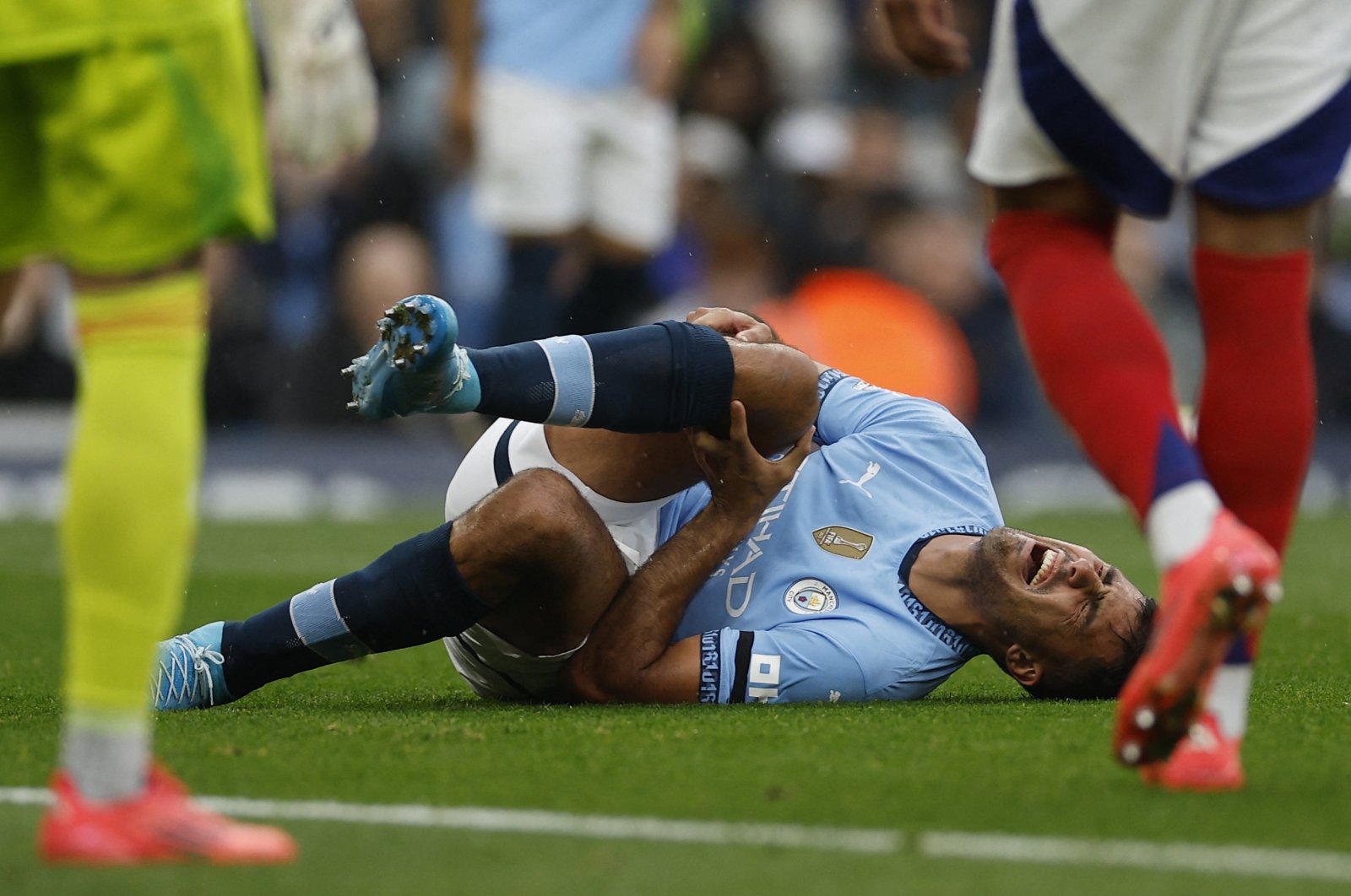 Manchester City&#039;s Rodri reacts after sustaining an injury during the Premier League match against Arsenal at the Etihad Stadium, Manchester, U.K., Sept. 22, 2024. (Reuters Photo)