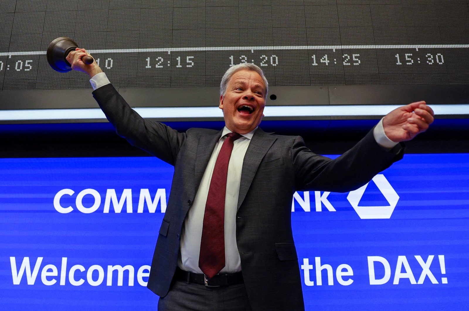 Manfred Knof, chair of the board of managing directors at Commerzbank, rings the opening bell on the first trading as Commerzbank rejoins the DAX index at the stock exchange in Frankfurt, Germany, Feb. 27, 2023. (Reuters Photo)