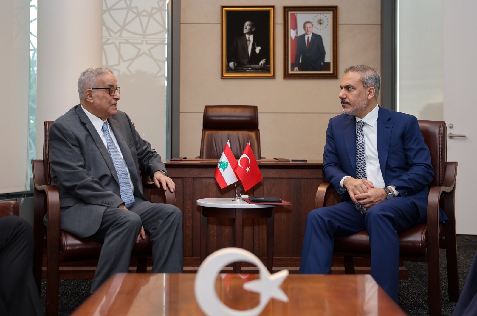 Foreign Minister Hakan Fidan and Lebanese Foreign Minister Abdallah Bouhabib speak at a meeting in New York, Sept. 25, 2024. (AA Photo)