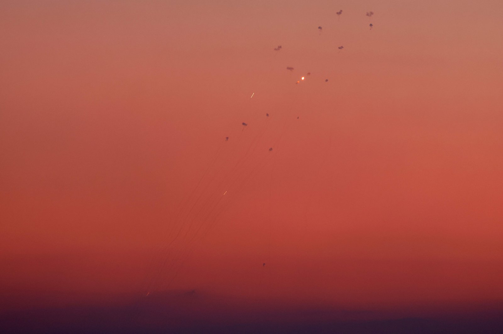  Rockets allegedly fired from southern Lebanon are intercepted by Israel&#039;s Iron Dome air defense system over northern Israel on Sept. 23, 2024. (AFP Photo)