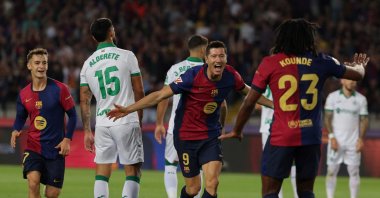 Barcelona's Robert Lewandowski (C) celebrates after scoring his team's first goal during the La Liga match against Getafe at the Estadi Olimpic Lluis Companys, Barcelona, Spain, Sept. 25, 2024. (AFP Photo)