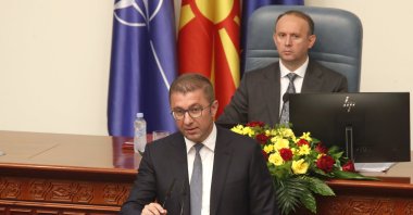 Hristijan Mickoski speaks to lawmakers during a session in the parliament building in Skopje, North Macedonia, Sunday, June 23, 2024. (AP File Photo)