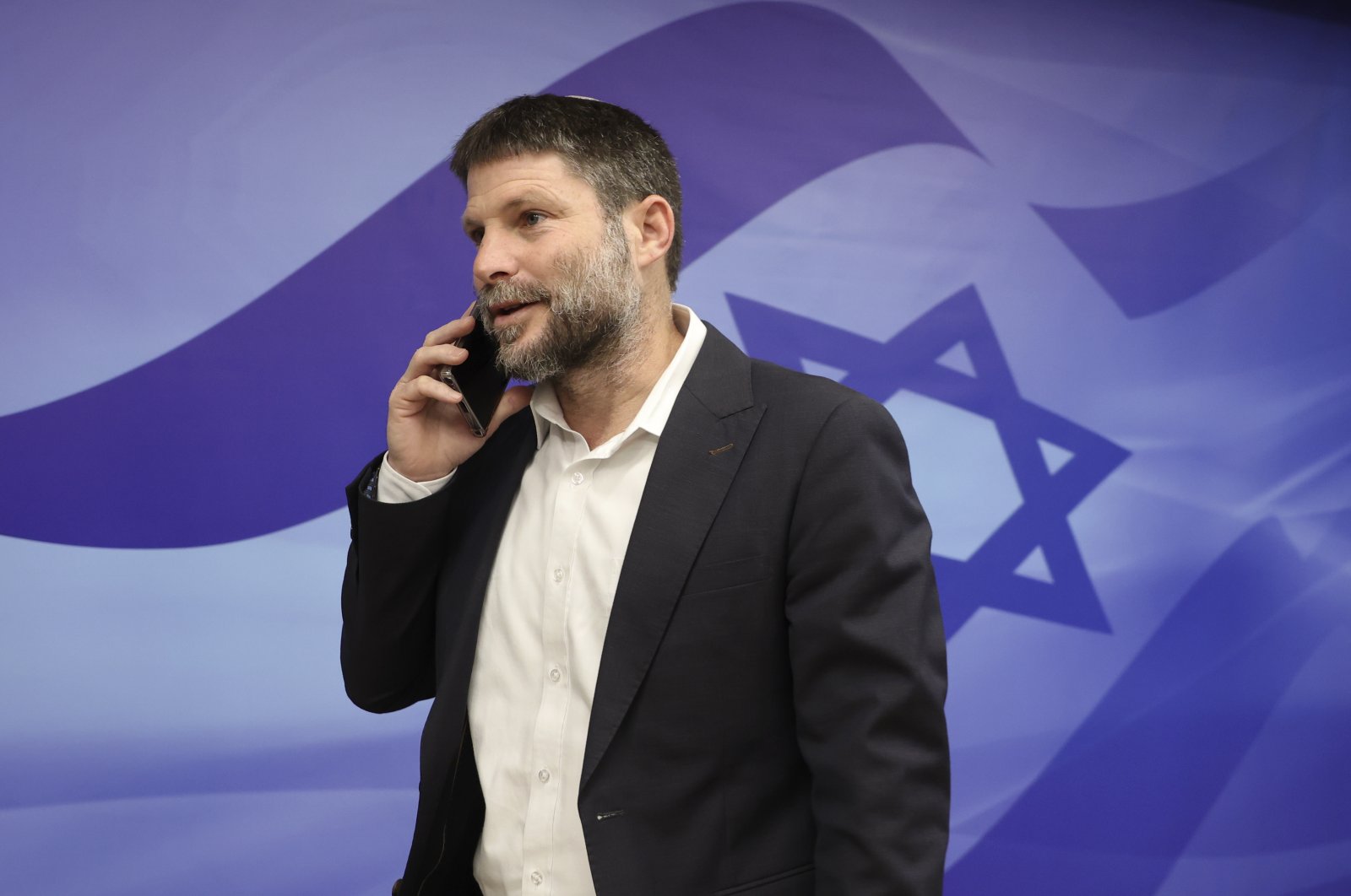 Israeli Finance Minister Bezalel Smotrich arrives for a weekly cabinet meeting in Jerusalem, March 5, 2023. (AP Photo)