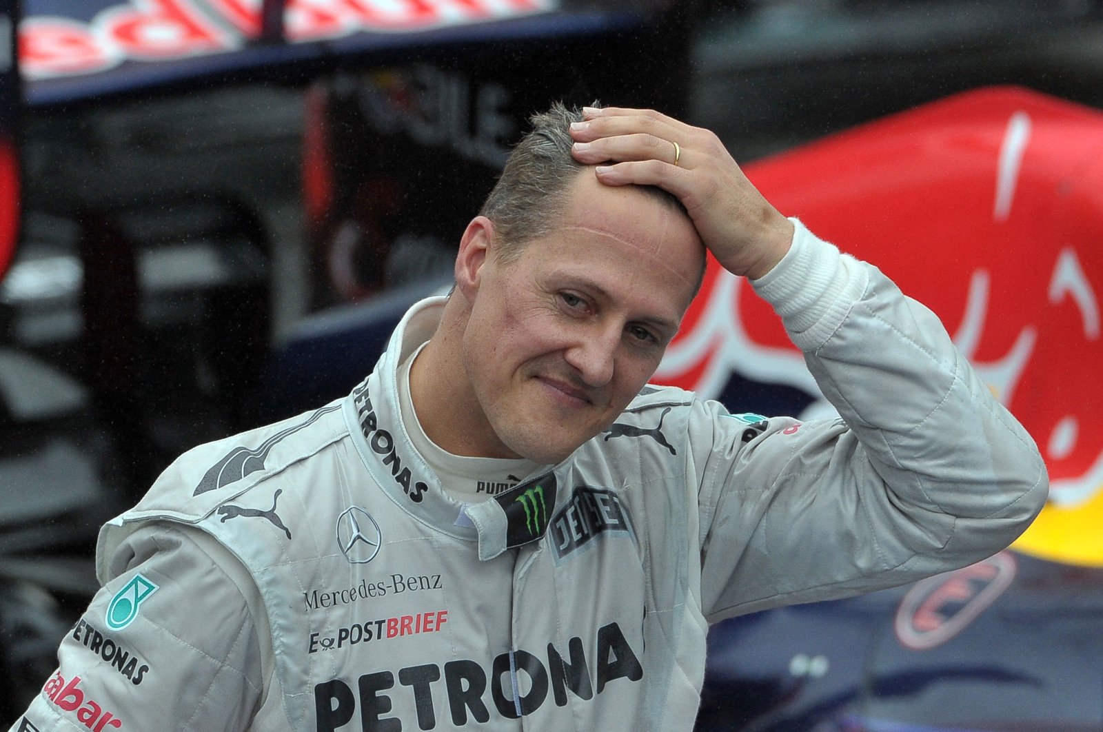 German Formula One driver Michael Schumacher gestures at the end of the Brazil&#039;s F1 GP at the Interlagos racetrack, Sao Paulo, Brazil, Nov. 25, 2012. (AFP Photo)