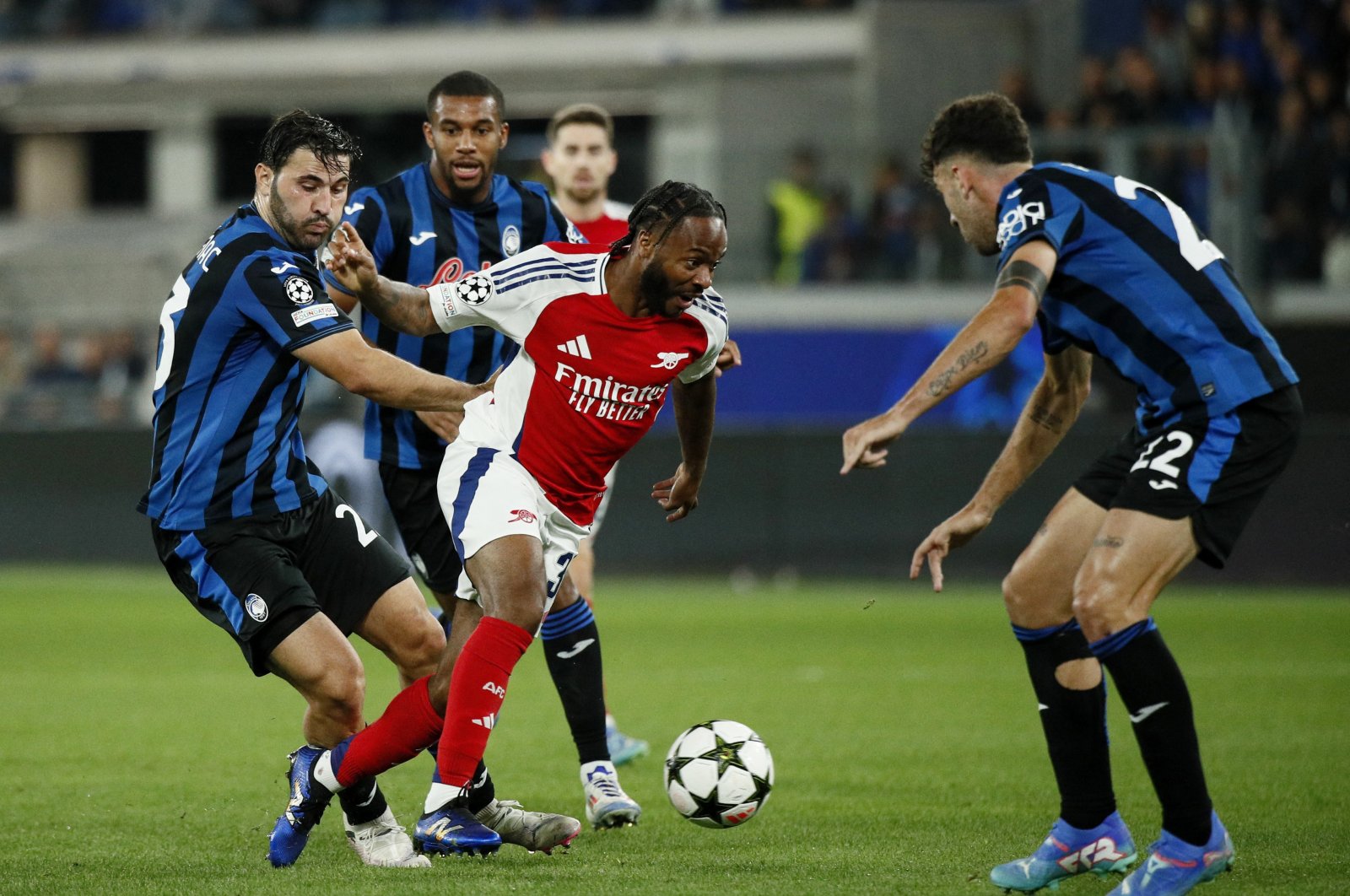 Arsenal&#039;s Raheem Sterling (C) in action with Atalanta&#039;s Sead Kolasinac and Matteo Ruggeri during a Champions League match at the Gewiss Stadium, Bergamo, Italy, Sept. 19, 2024. (Reuters Photo)