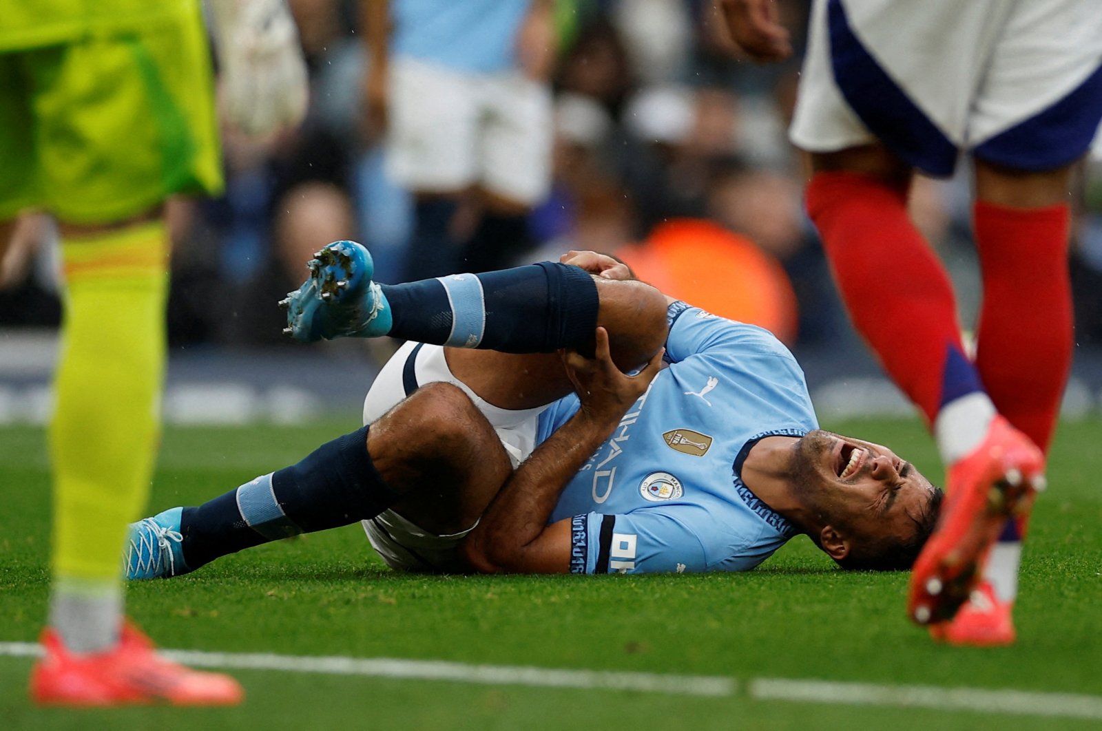 Manchester City&#039;s Rodri reacts after sustaining an injury during a Premier League match against Arsenal at the Etihad Stadium, Manchester, U.K., Sept. 22, 2024. (Reuters Photo) 