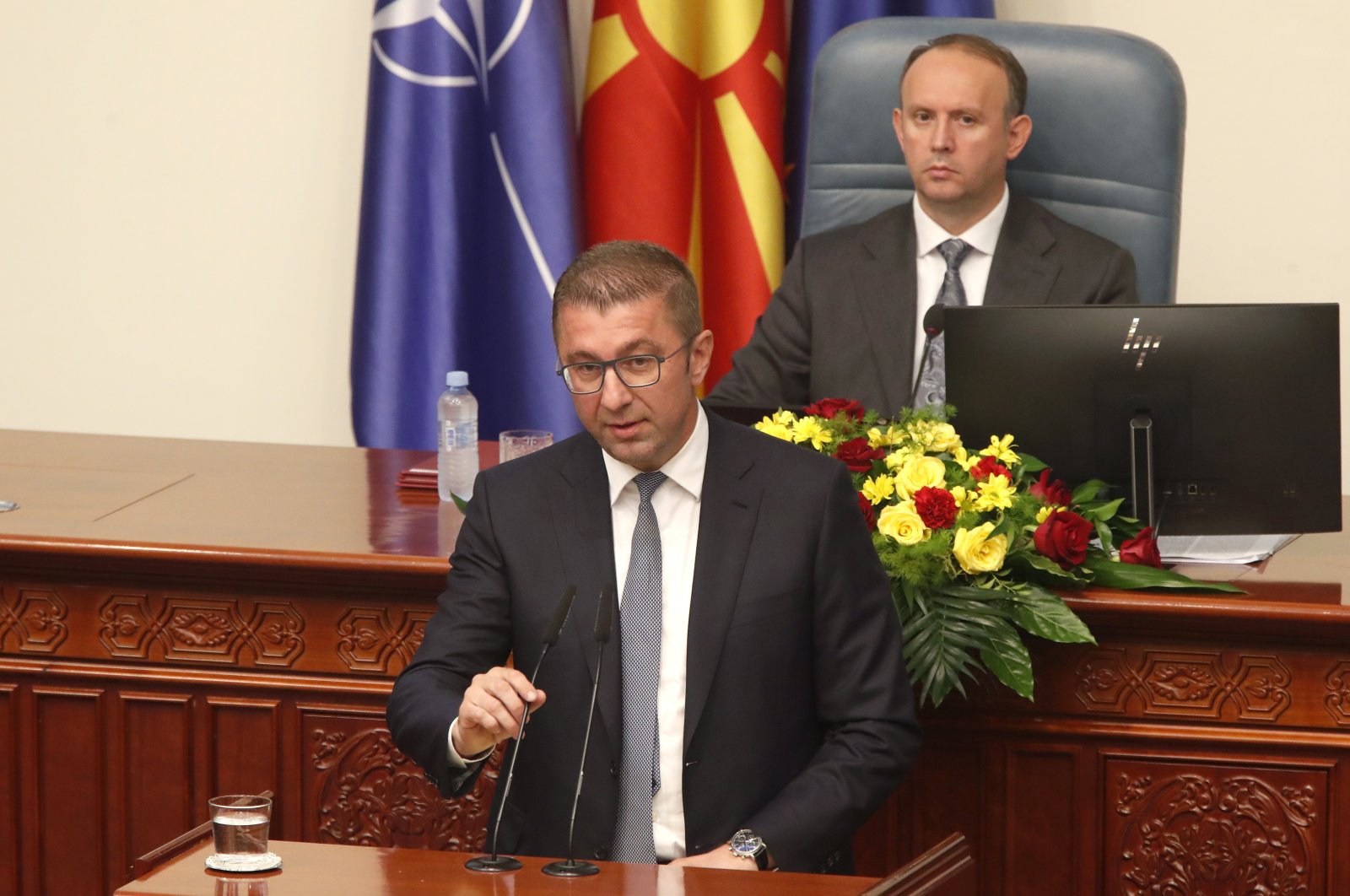 Hristijan Mickoski speaks to lawmakers during a session in the parliament building in Skopje, North Macedonia, Sunday, June 23, 2024. (AP File Photo)