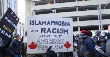 People with posters rejecting racism and Islamophobia during a rally in Toronto, Canada, Feb. 4, 2017. (AP File Photo)